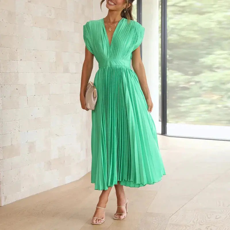 DressGlam - Elegant Plissert Maxikjole for Vår- og Sommerfester Motelys