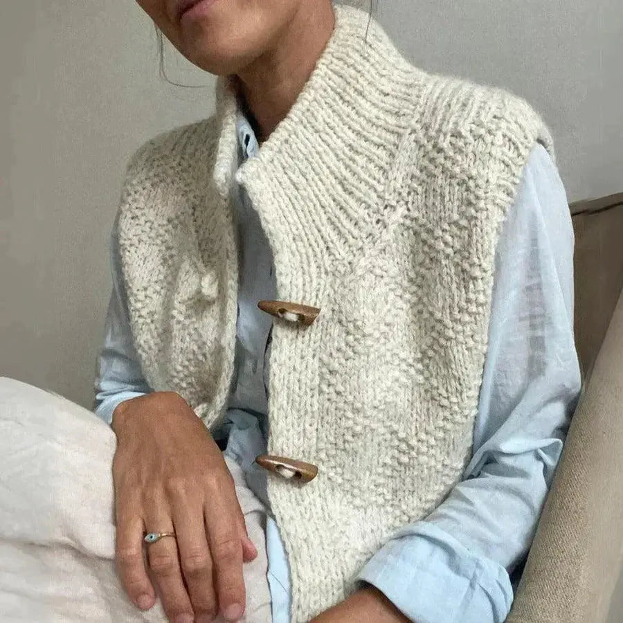 Ermeløs ullkofta med knapper til dame Motelys