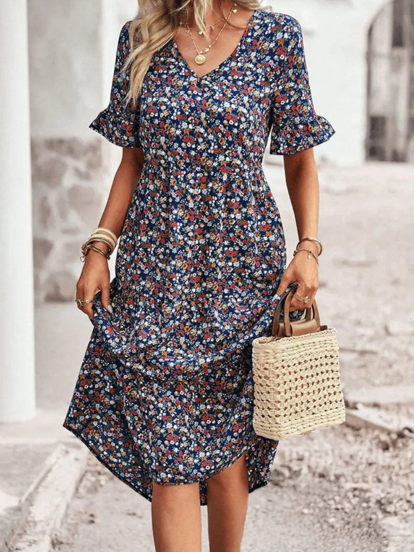 FloralVogue - Stilig Blomstret Midikjole for Feminin Eleganse Motelys
