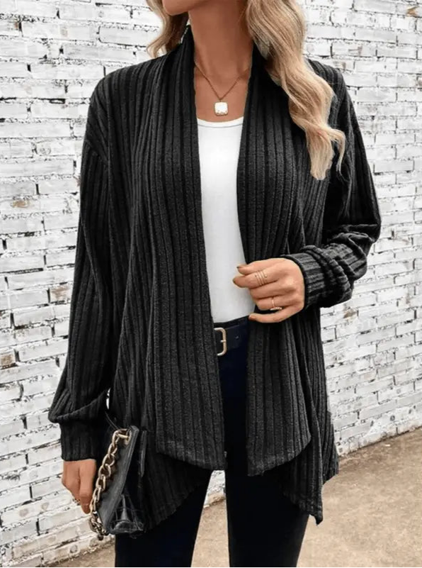 CozyCocoon - Vest i Flaggermusstrikk for En Trendy Vinterlook Motelys