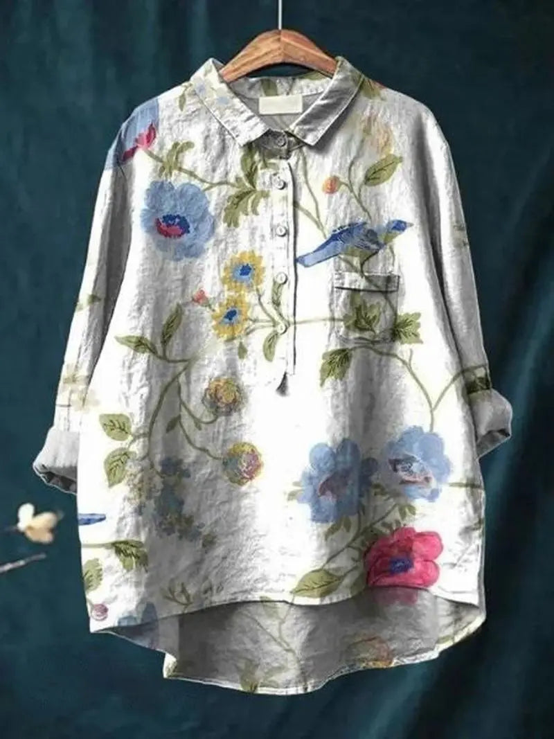 FloralVibe - Bluse med Blomstermønster for En Fargerik Garderobe Motelys