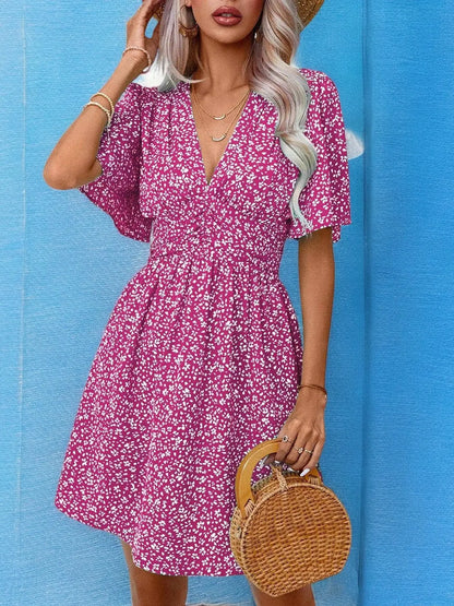 FloralDream - Elegant Blomstret Minikjole med V-Hals for Sommerstil Motelys