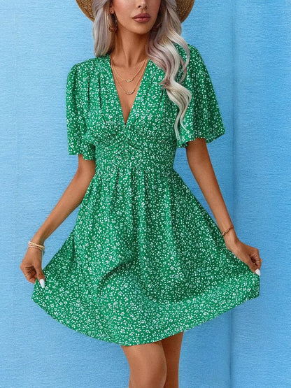 FloralDream - Elegant Blomstret Minikjole med V-Hals for Sommerstil Motelys