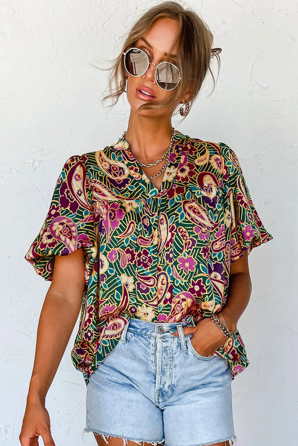 Bluse med korte bobleermer Motelys