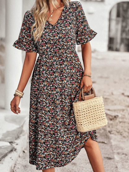 FloralVogue - Stilig Blomstret Midikjole for Feminin Eleganse Motelys