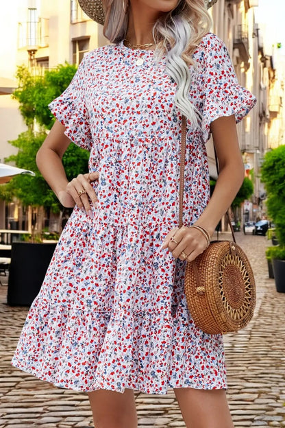 Floral Elegance Lagdelt Kjole – Flytende Volangs ermer Motelys